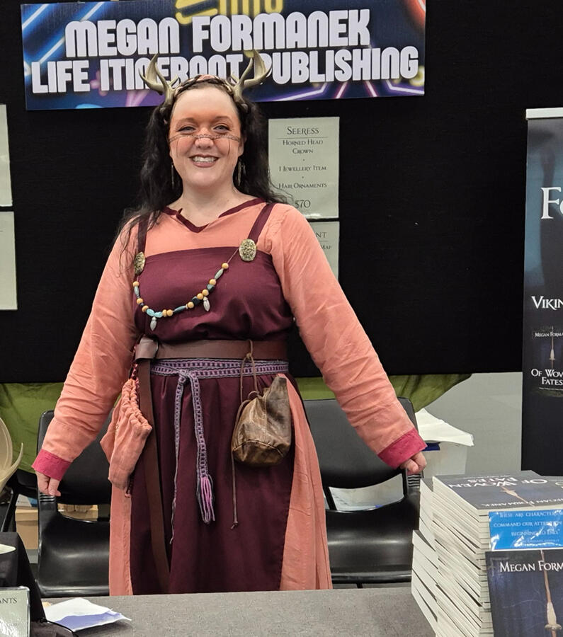 PopFest Townsville 2025 Megan Formanek dressed in fantasy inspired Viking Age seeress costume.